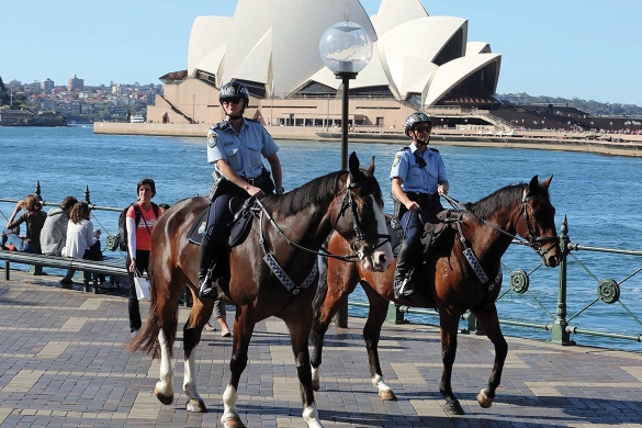 project servator police officers on horseback in front of Sydney Opera House