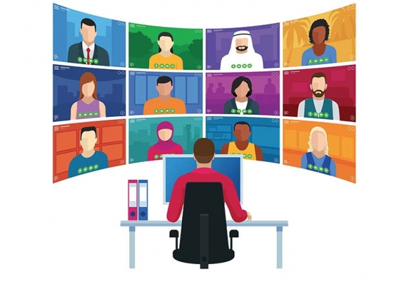 Man facing bank of screens