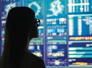 woman looking at graphs