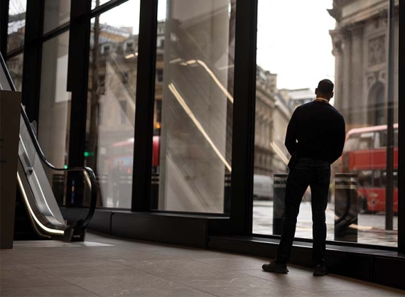 security officer looking out on city scene