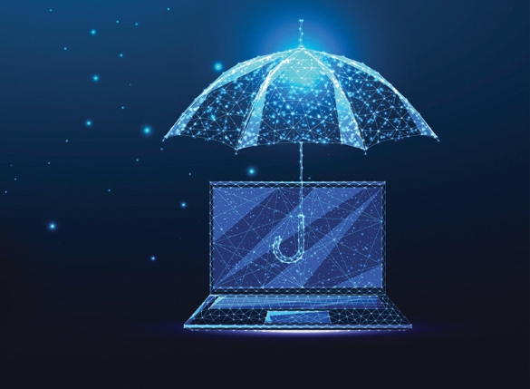 umbrella protecting a laptop