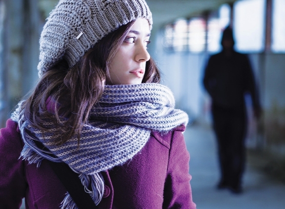 woman looking over her shoulder